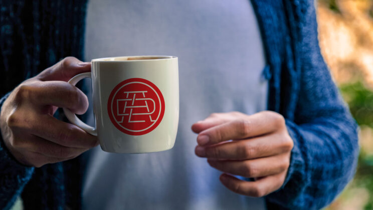 model-holding-coffee-mug-mockup-02